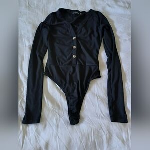 PrettyLittleThing Black Long Sleeve Button Detail Bodysuit (NWOT)